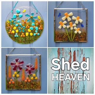 Two framed floral glass squares and circular hanger.