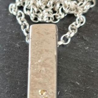 Solid sterling silver bar necklace with gold highlights