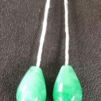 Handbeaten sterling silver earrings with teardrop green stone