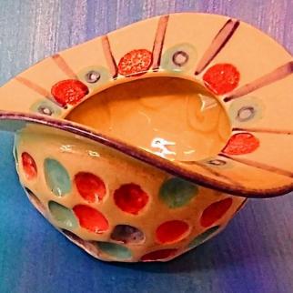 Stoneware dimpled pot with curved flange, orange and blue underglaze with transparent glaze