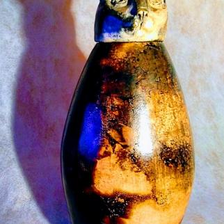 Smoke fired jar with modelled head of cat for a lid. Inspired by those of ancient Egypt