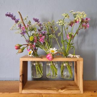 Oak floating vase stand with fresh flowers