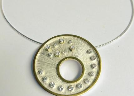 Silver, gold and diamond pendant 